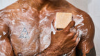 Dr. Squatch Mango Butter bar soap being used