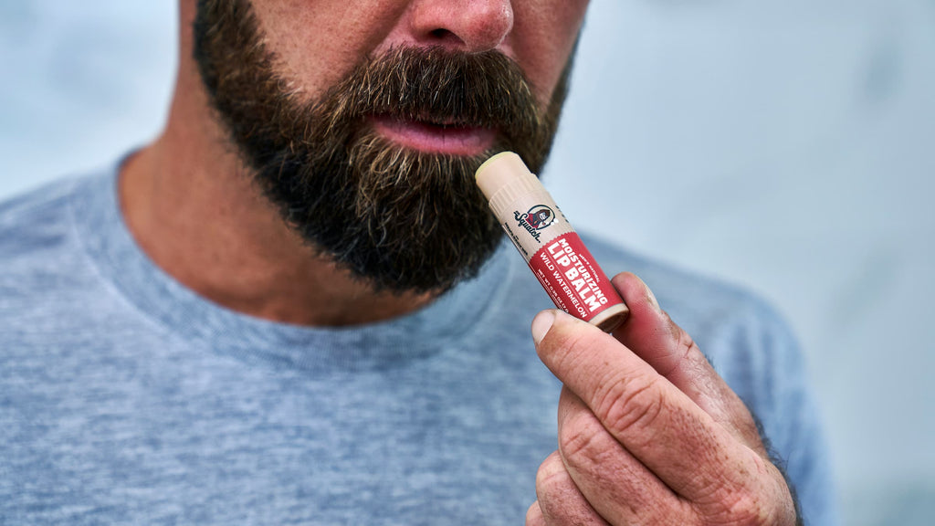 Dr. Squatch Wild Watermelon Lip Balm being used